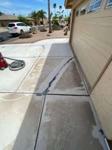 Driveway with cracks.