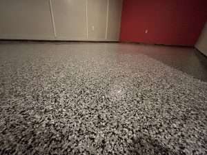 Basement transformation with eclipse flakes from Galaxy Concrete Coating