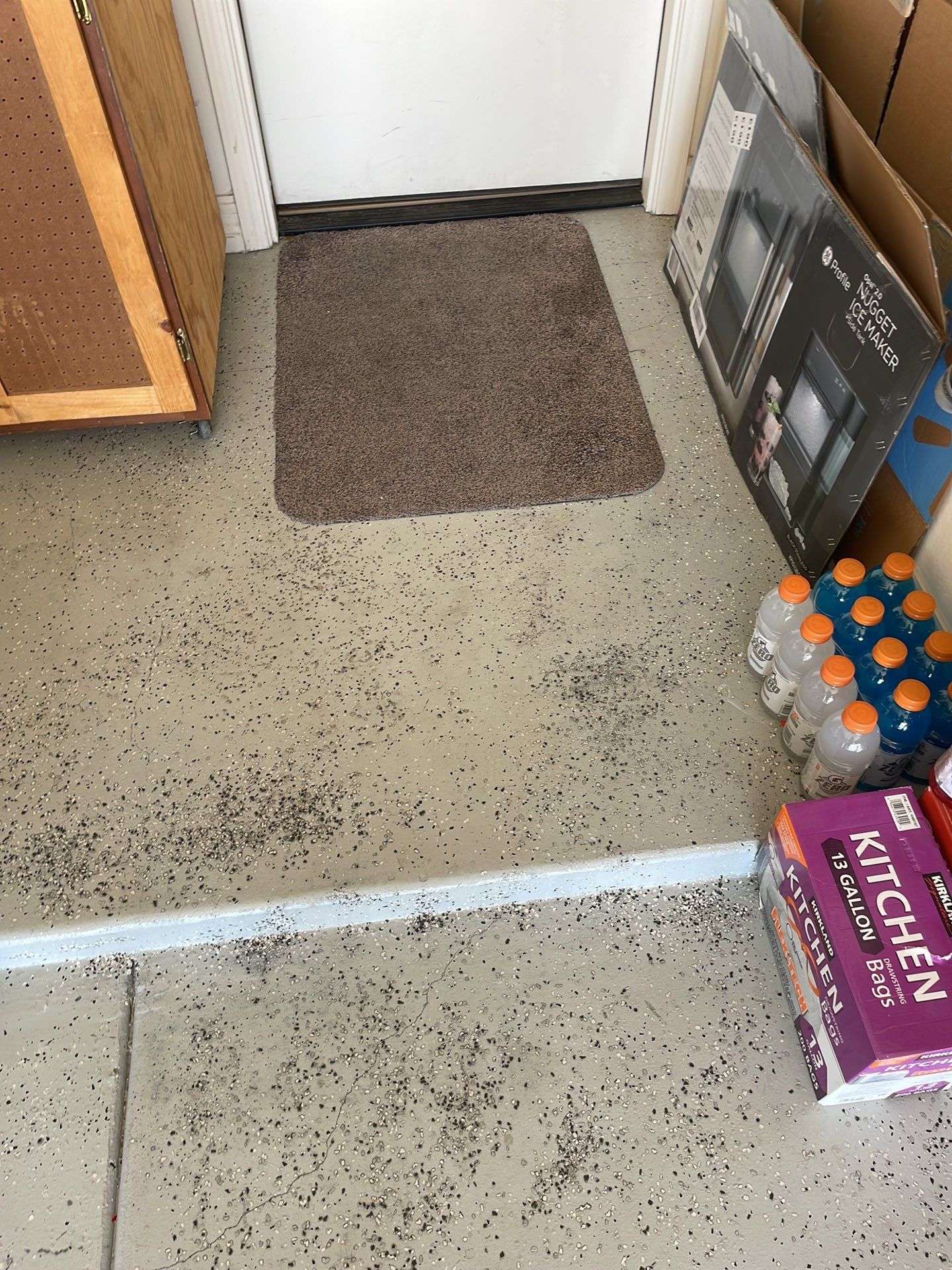 Garage floor that had epoxy coating on it